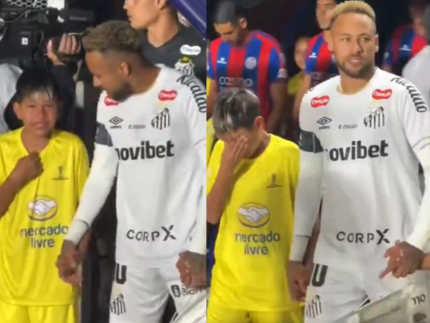 Neymar se emociona ao entrar em campo com criança antes de jogo na Argentina